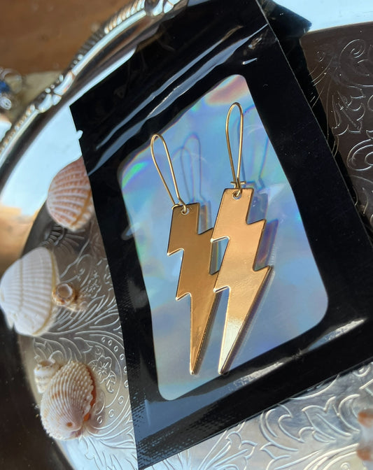 14k gold earrings with brass lightning bolts